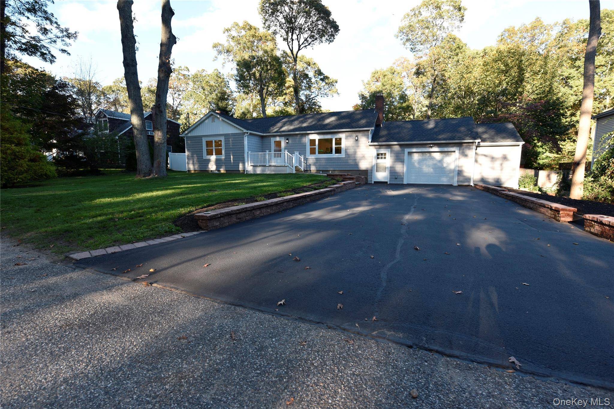 Welcome to this beautifully updated ranch nestled on a serene 0.