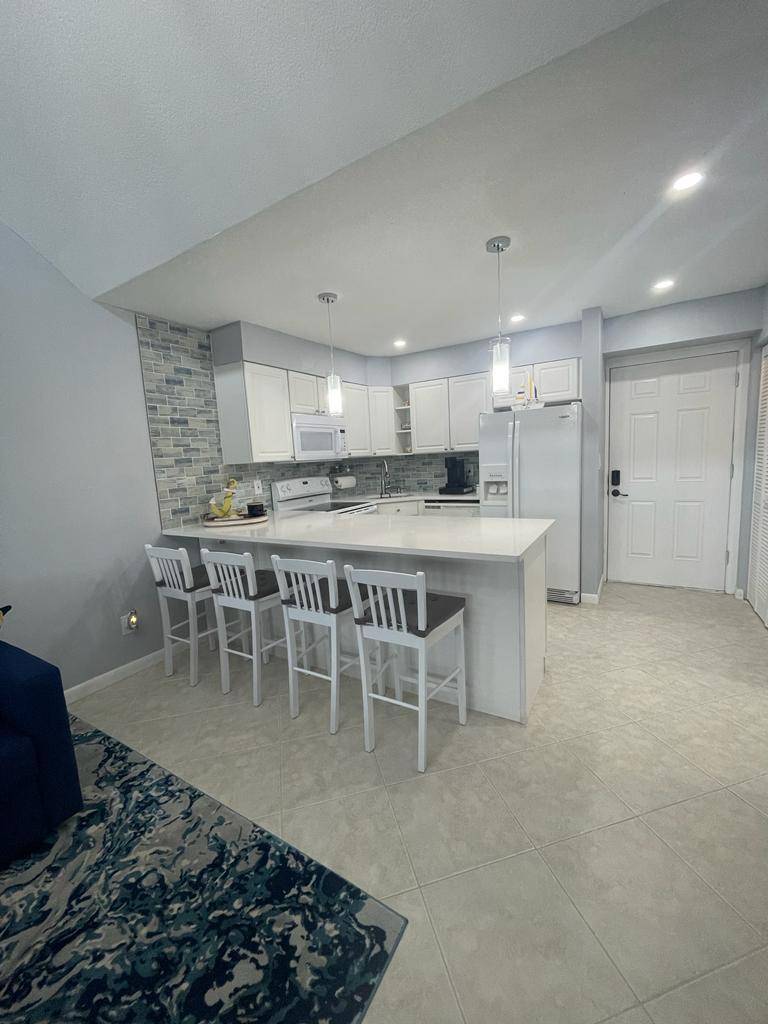 Income producing AIRBNB. Beautiful ocean views from this updated 1bed 1bath condo in the desirable private gated community of Ocean Village, resort style amenities.