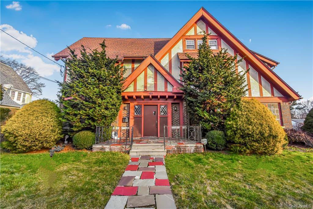 Magnificent Tudor located in sought after Chester Hill Park !