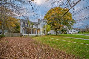 MOTIVATED SELLERS ! ! Adorable antique colonial situation on a large level partially fenced lot.