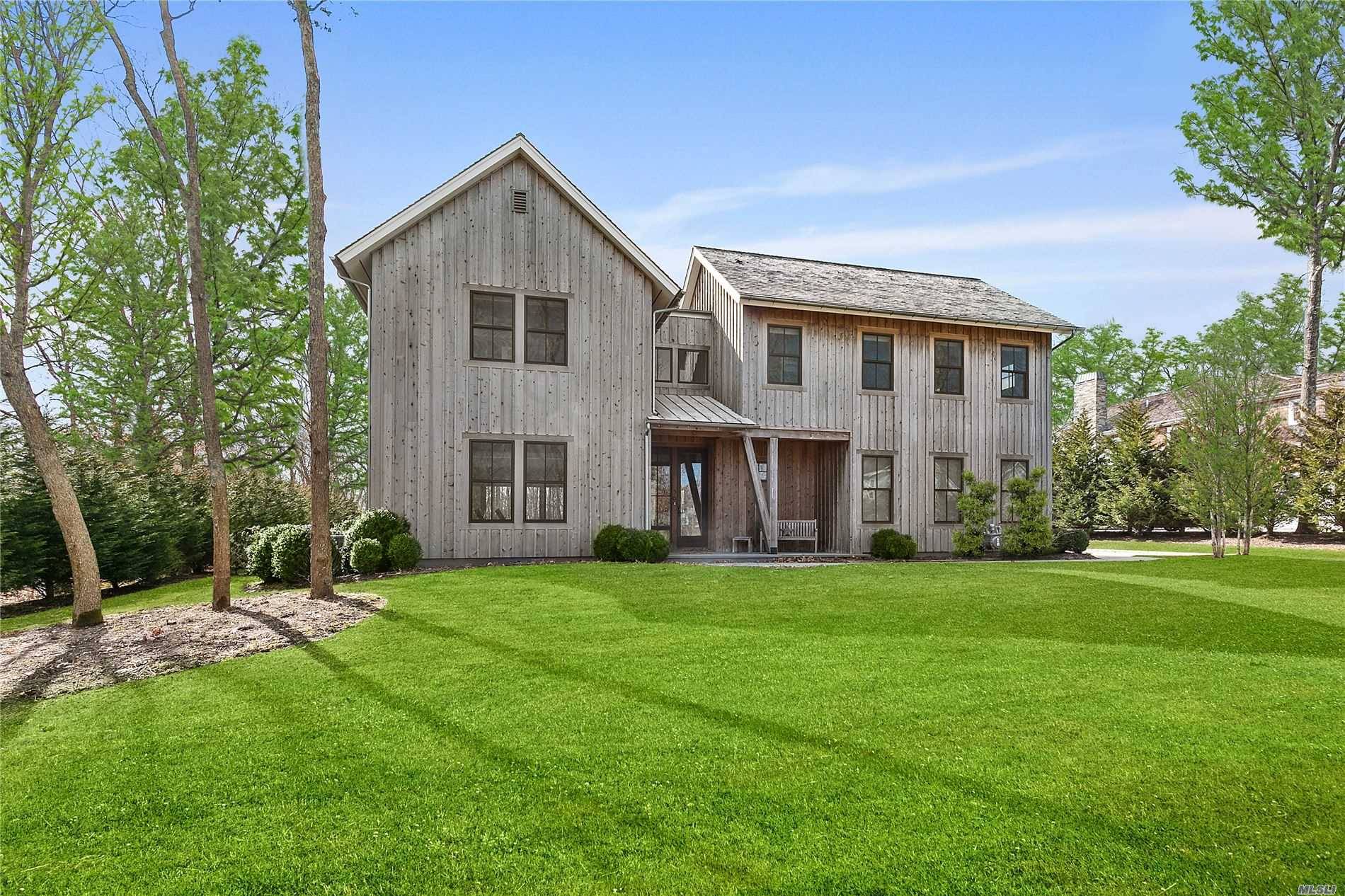 Offered for the first time for rent since its completion in 2017, this 'Mecox Barn' style 6 Bedroom home nestled on a quiet stretch of Bridgehampton's acclaimed Barn amp ; ...