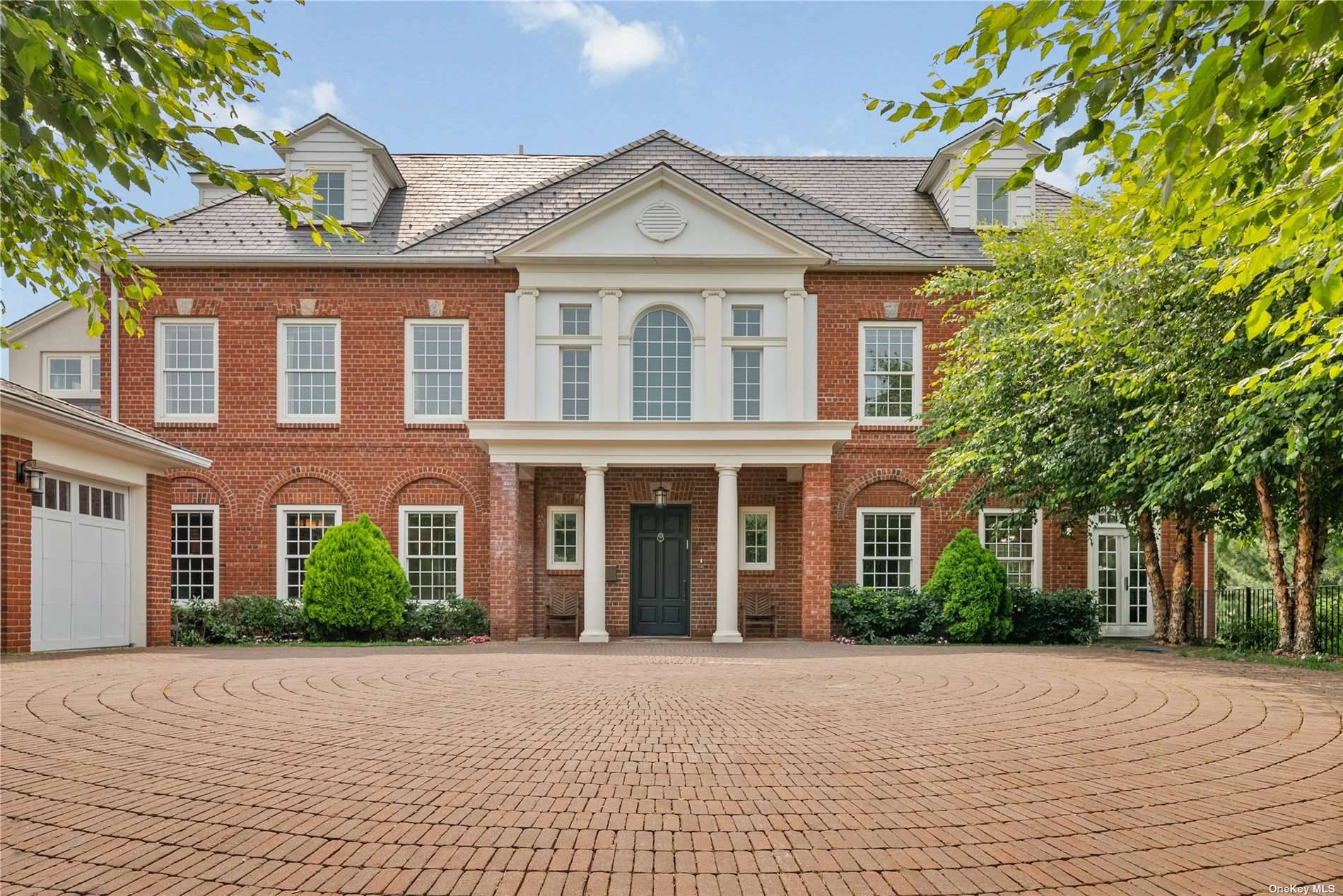 Welcome to 5020 Grosvenor, an exquisite neo Georgian masterpiece reminiscent of the grand estate homes that graced the early decades of the twentieth century.