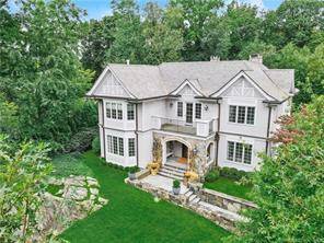 Stunning sun filled 6 bedroom custom home in coveted Milbrook Association.