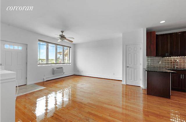 Sunlight Filled Rockaway Beach Oceanfront Duplex with separate entrance to Deeded Parking spot just outside.