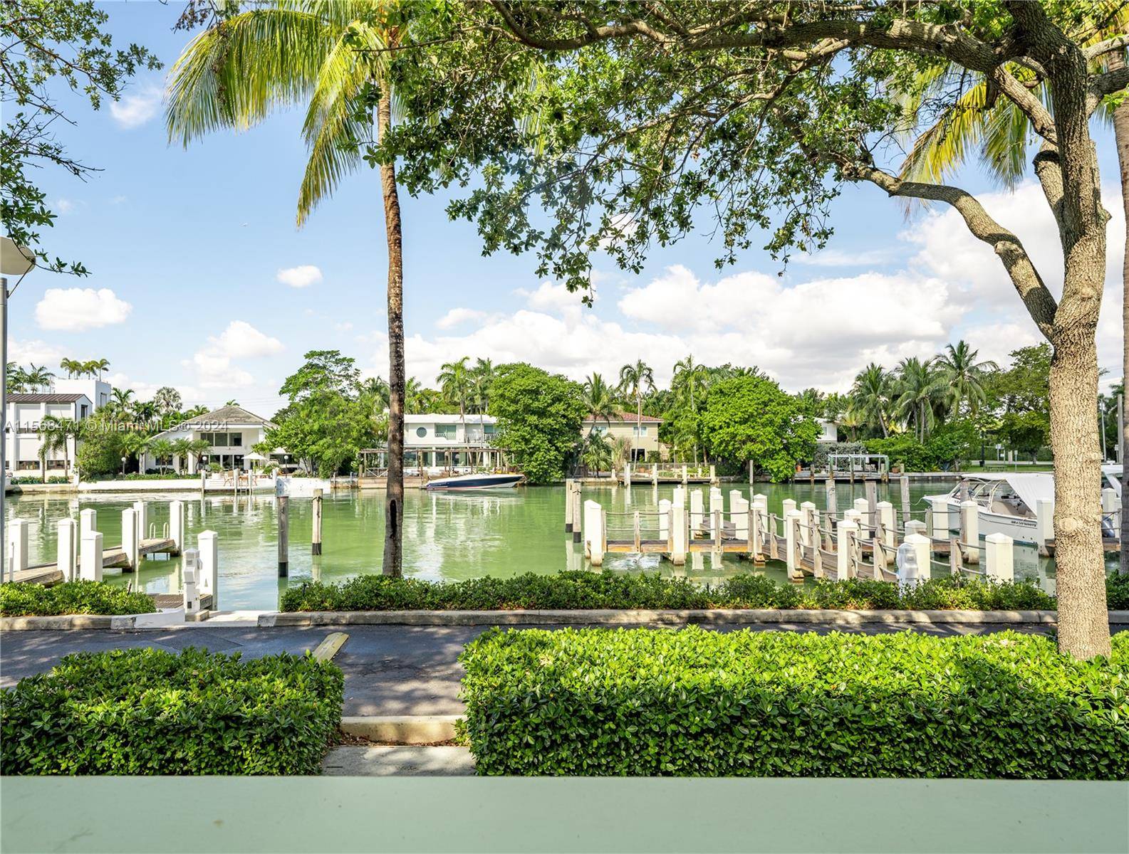 Waterfront, Dock, Privacy, Security and Amenities, this upgraded 5 bed 5 1 2 bath Waterfront Corner Home by architect Allan Shulman has sunset downtown views in exclusive gated AQUA.