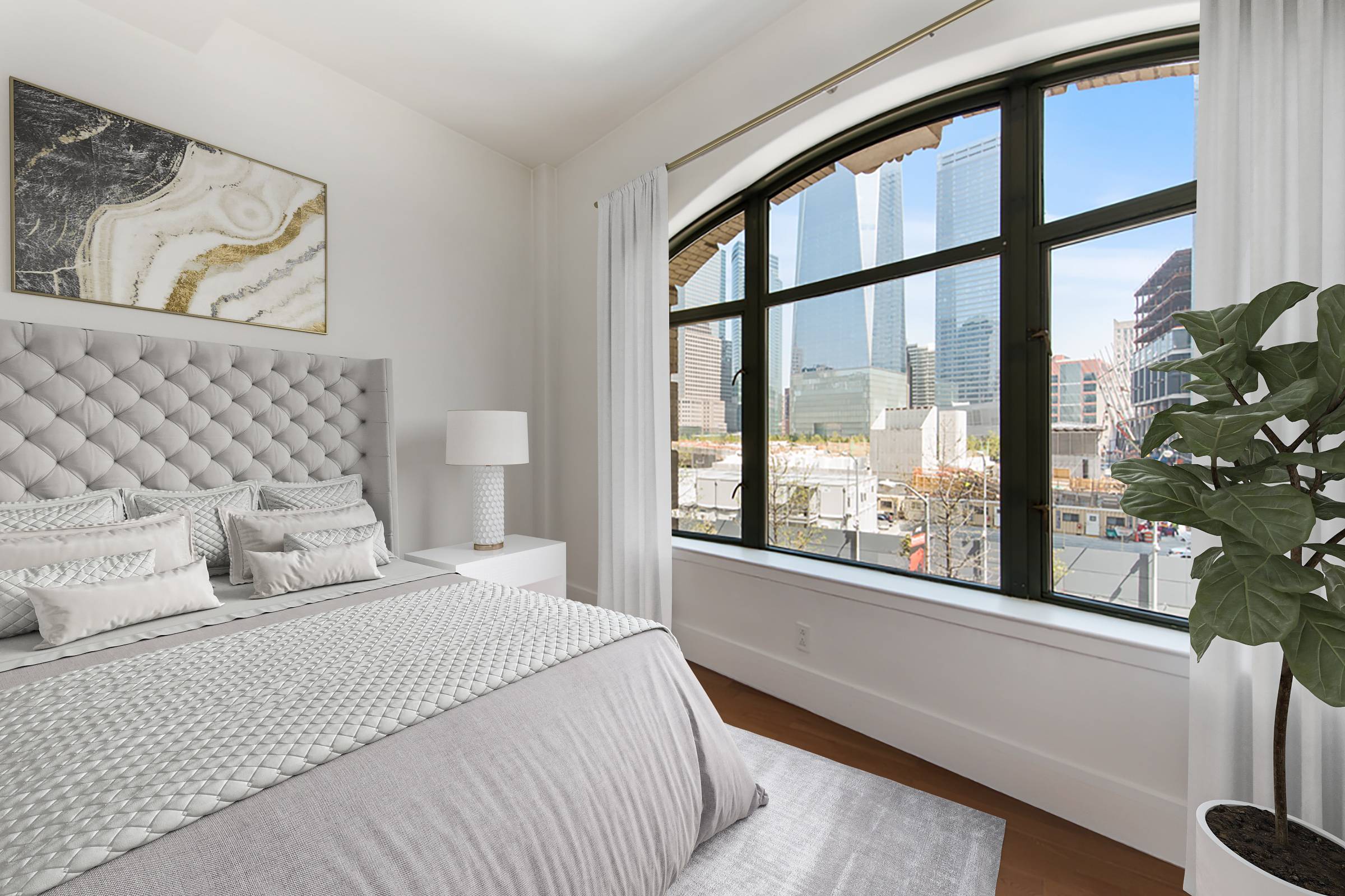 This beautiful one bedroom home features enormous arched windows, 10 and a half foot ceilings, and spectacular views of the Freedom Tower !