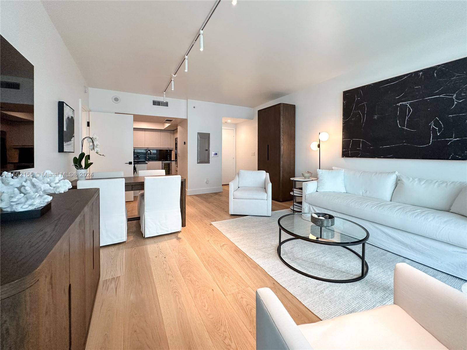 Experience Luxury in This Fully Remodeled, Rare 1 Bed, 1 Bath Unit in Jade at Brickell with Two Parking Spaces.