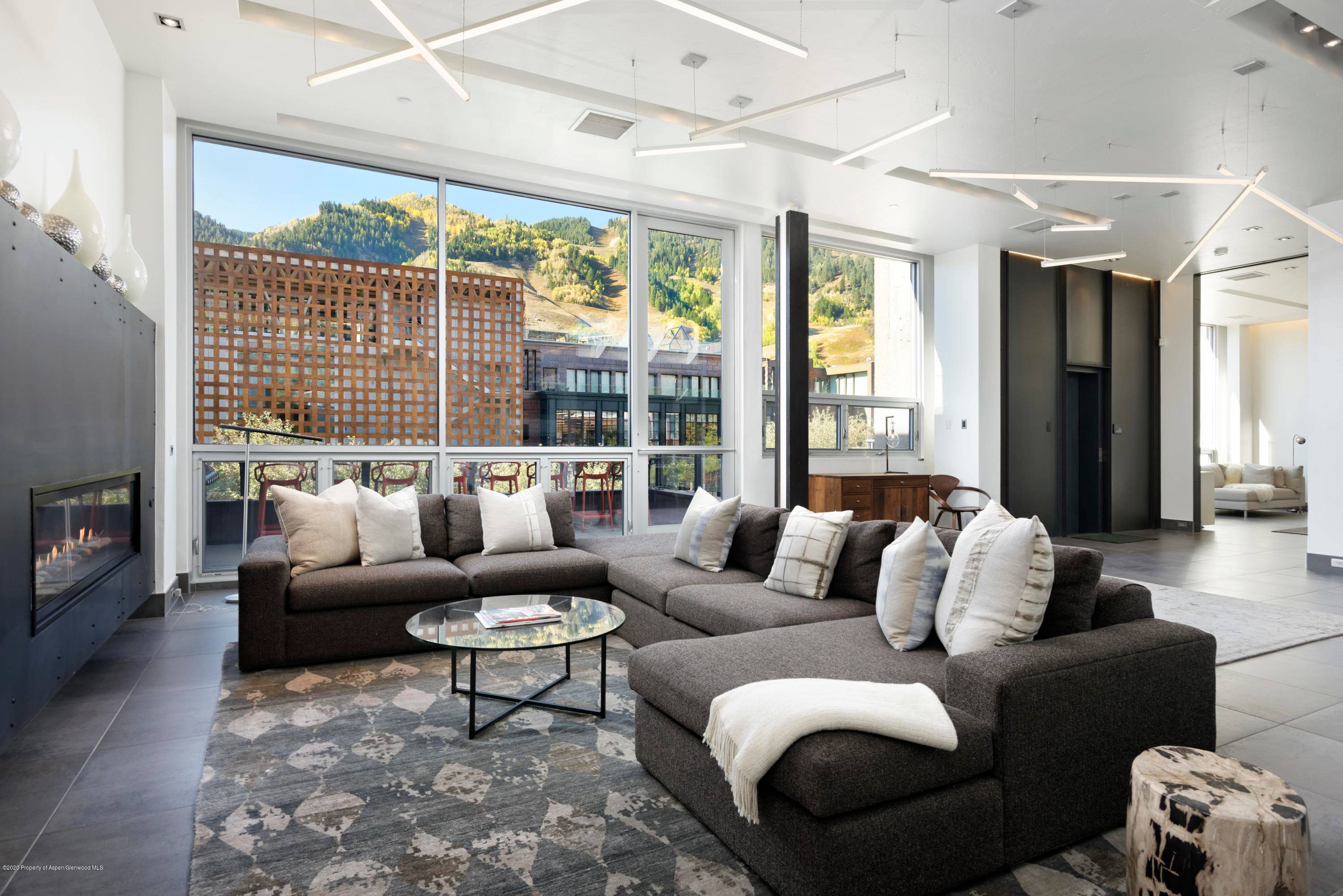 Sophisticated Aspen Core Penthouse exudes style with breathtaking Mountain views from all living areas and the master suite.