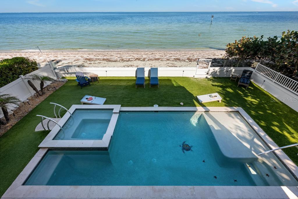 Direct Beachfront Living! Heated pool and spa