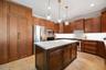 Large center island with lots of cabinet & drawer storage