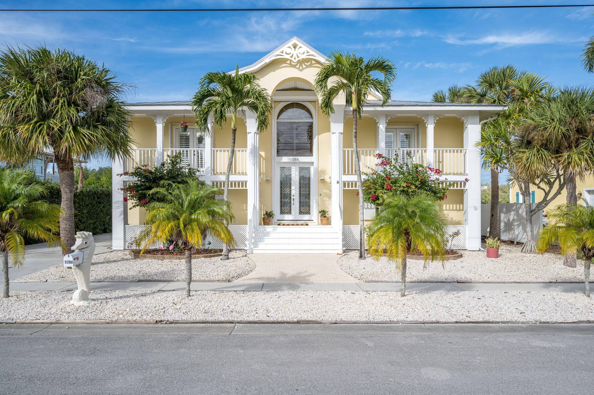 Postcard perfect views with this Key West style home, waterfront living home that is situated on a private canal w an additional boat dock !