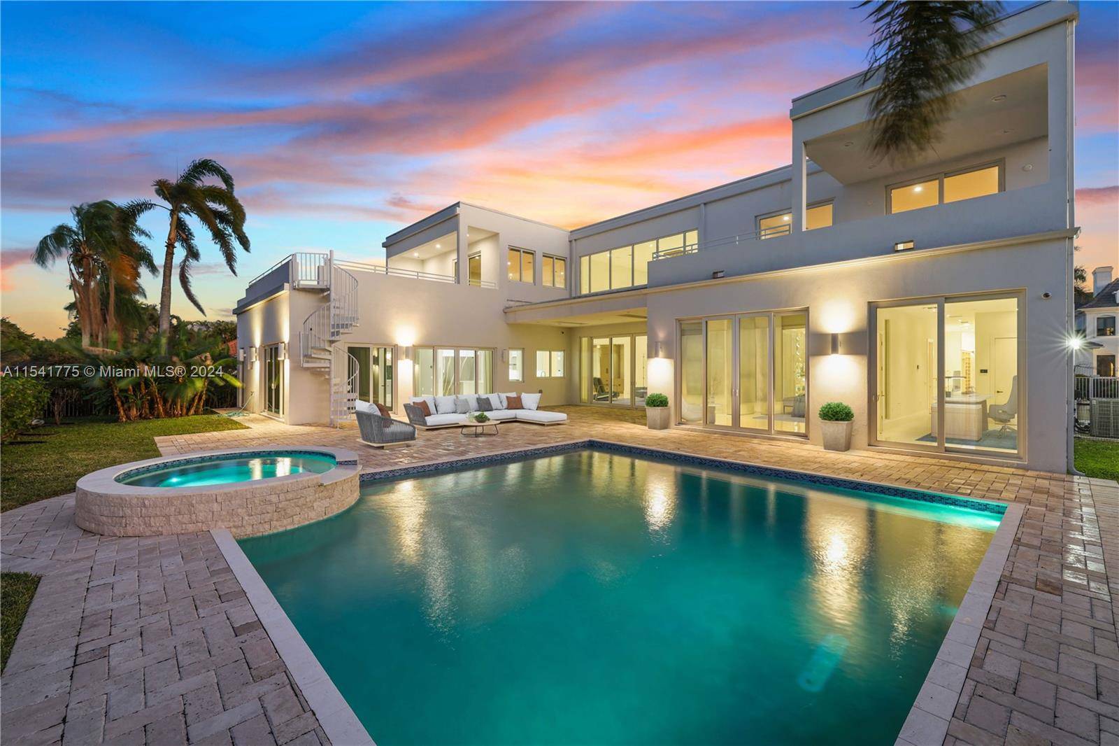 A magnificent, fully upgraded Villa Esther in the heart of Boca Grove Country Club with a luxurious, custom made Home Theater.