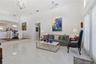 LIVING ROOM HAS 12' CEILINGS, 10" CROWN MOLDING WITH BEAUTIFUL WOODWORK
