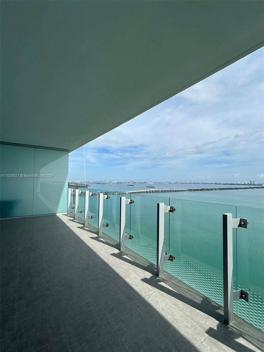 Located in the vibrant Edgewater Miami, the unit has full unobstructed bay views from all balconies.