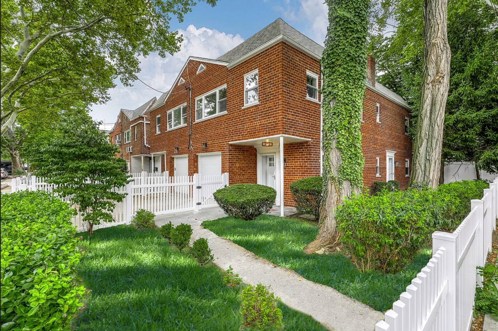 Sophistication meets perfection in this impeccably renovated, classic, all brick home.