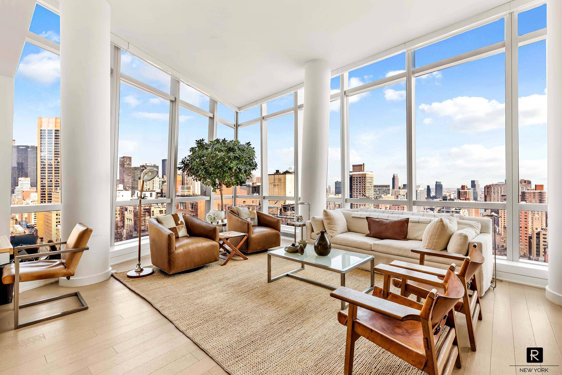 PANORAMIC NEW YORK CITY VIEWS from this sprawling, high floor three bedroom in 400 Park Avenue South.
