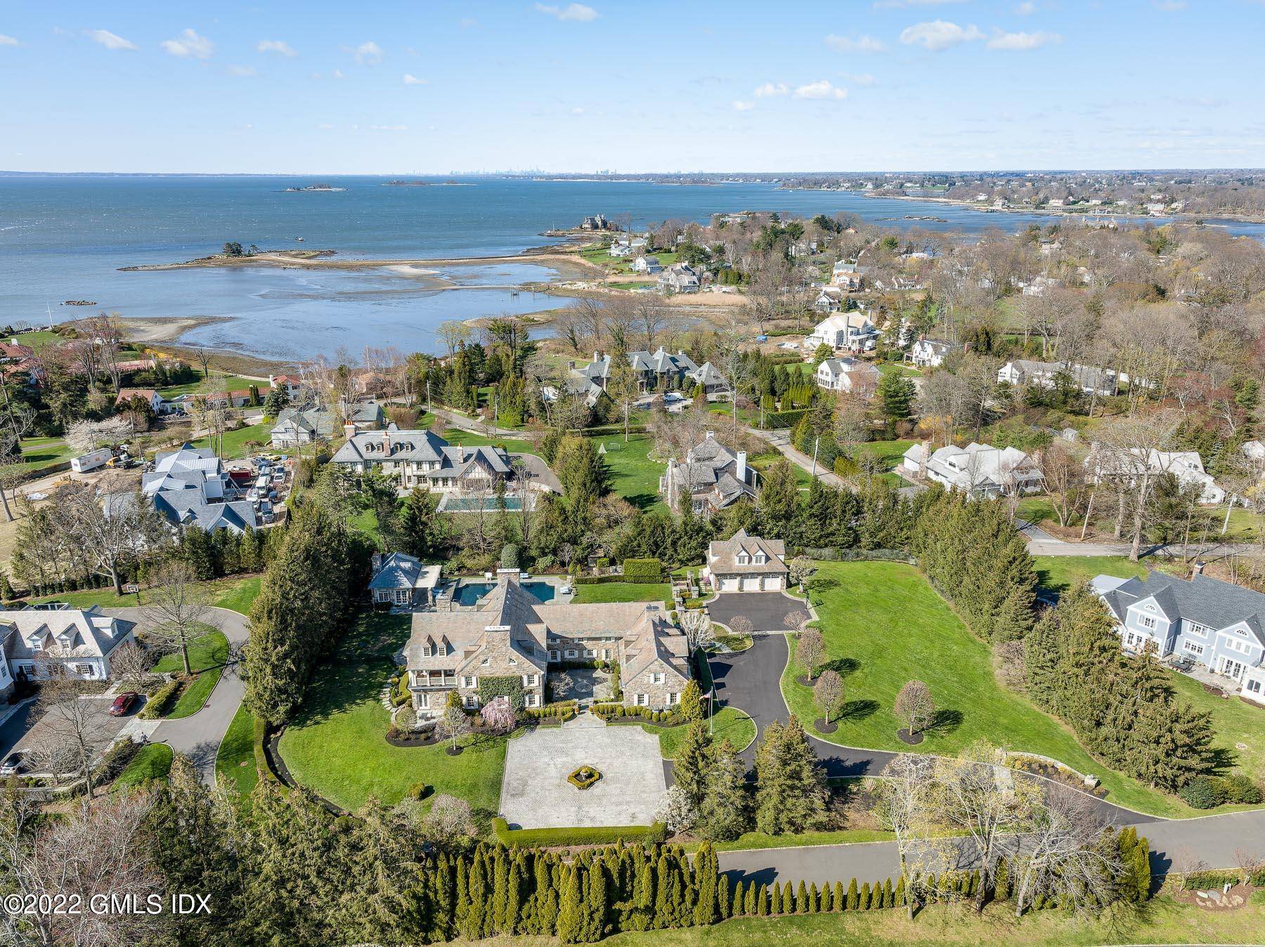 Enchanting 1926 fieldstone manor with deeded water access was deftly transformed by the current owners to encompass 8, 903 sq ft with 7 bedrooms and 7 baths.