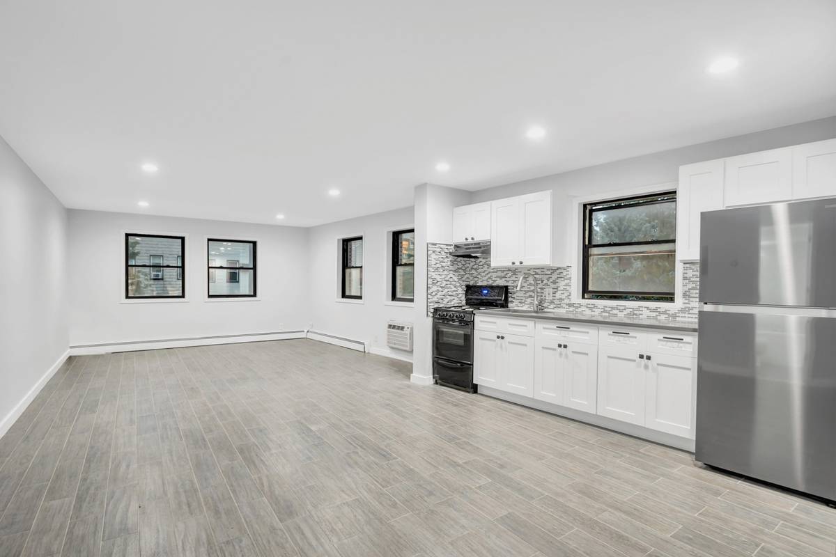 Welcome home to this large completely gut renovated two bedroom one bath apartment that spans the entire second floor of a private townhouse in the heart of Park Slope South.
