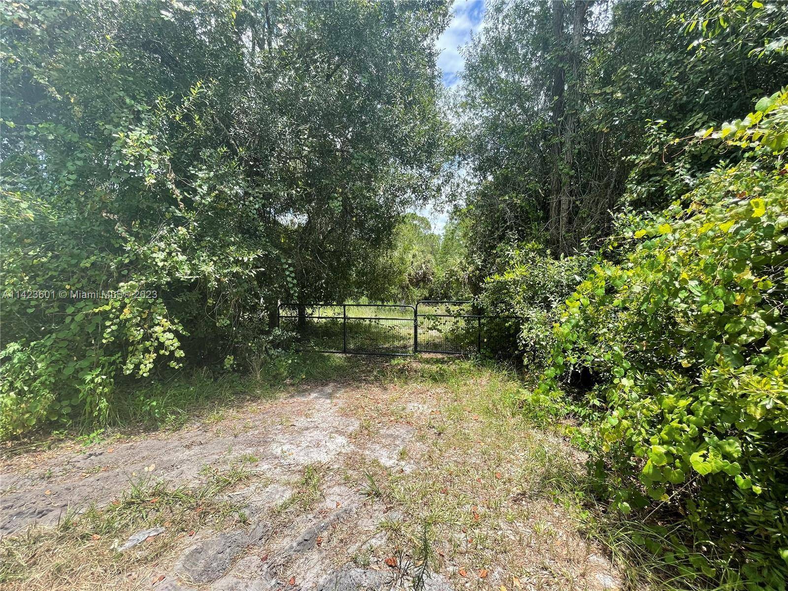 5 ACRE Lot, partially fenced.