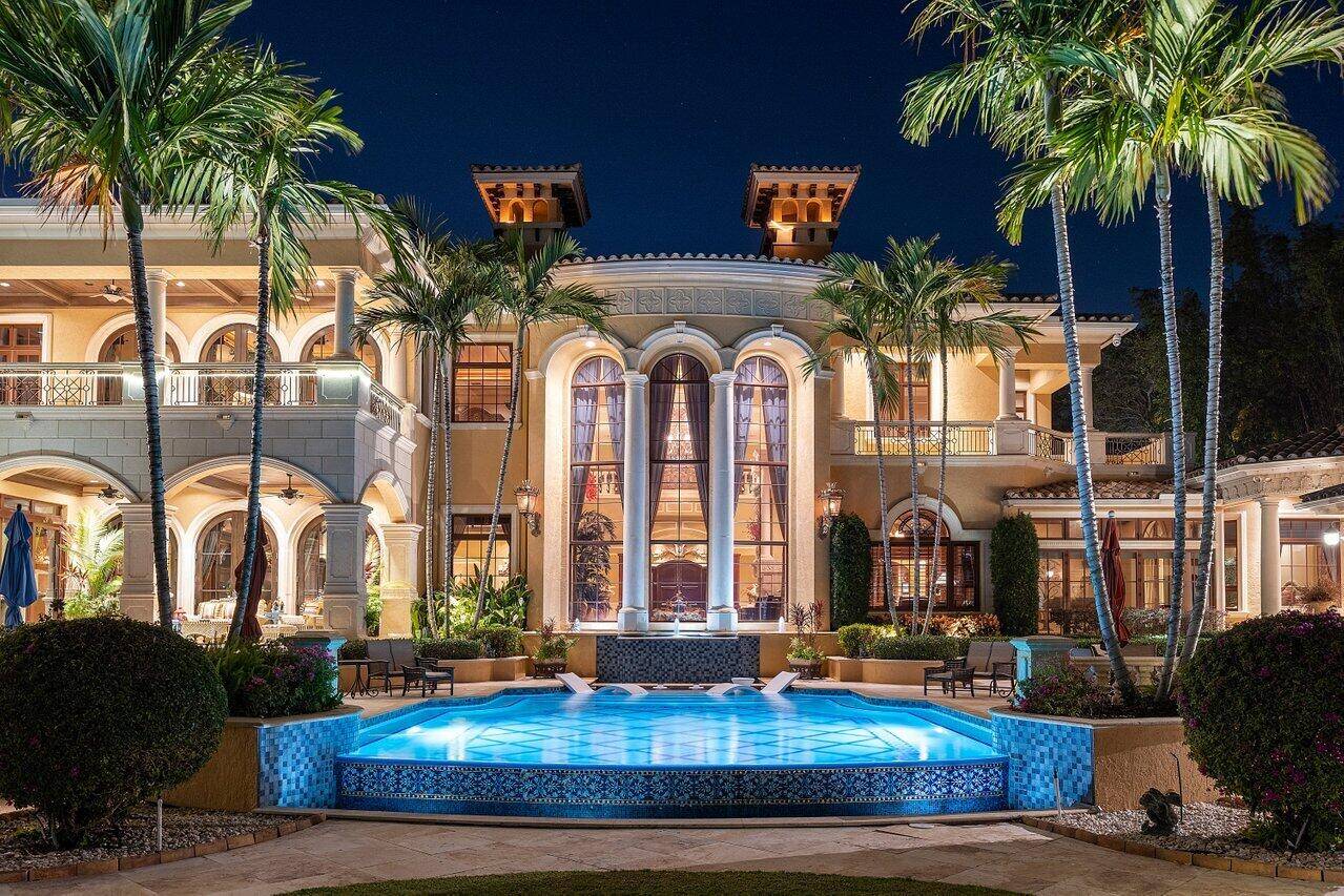 Experience the ultimate in waterfront living with this majestic estate sprawling nearly 3 acres of direct intracoastal waterway in the heart of Palm Beach Gardens.