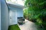 Casita building doorway to the laundry room and also features an outside wash basin