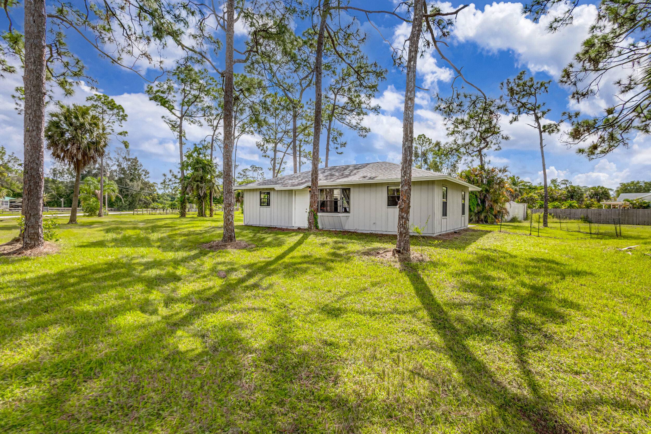 Experience the epitome of rural living in this charming 3 bedroom cabin style country residence.
