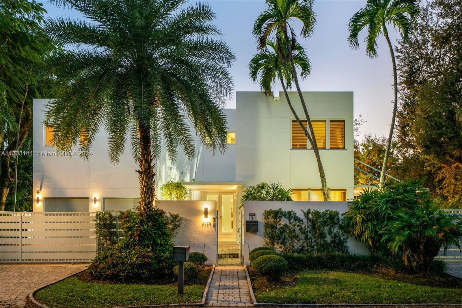 Discover your dream modern home in coveted Coconut Grove !