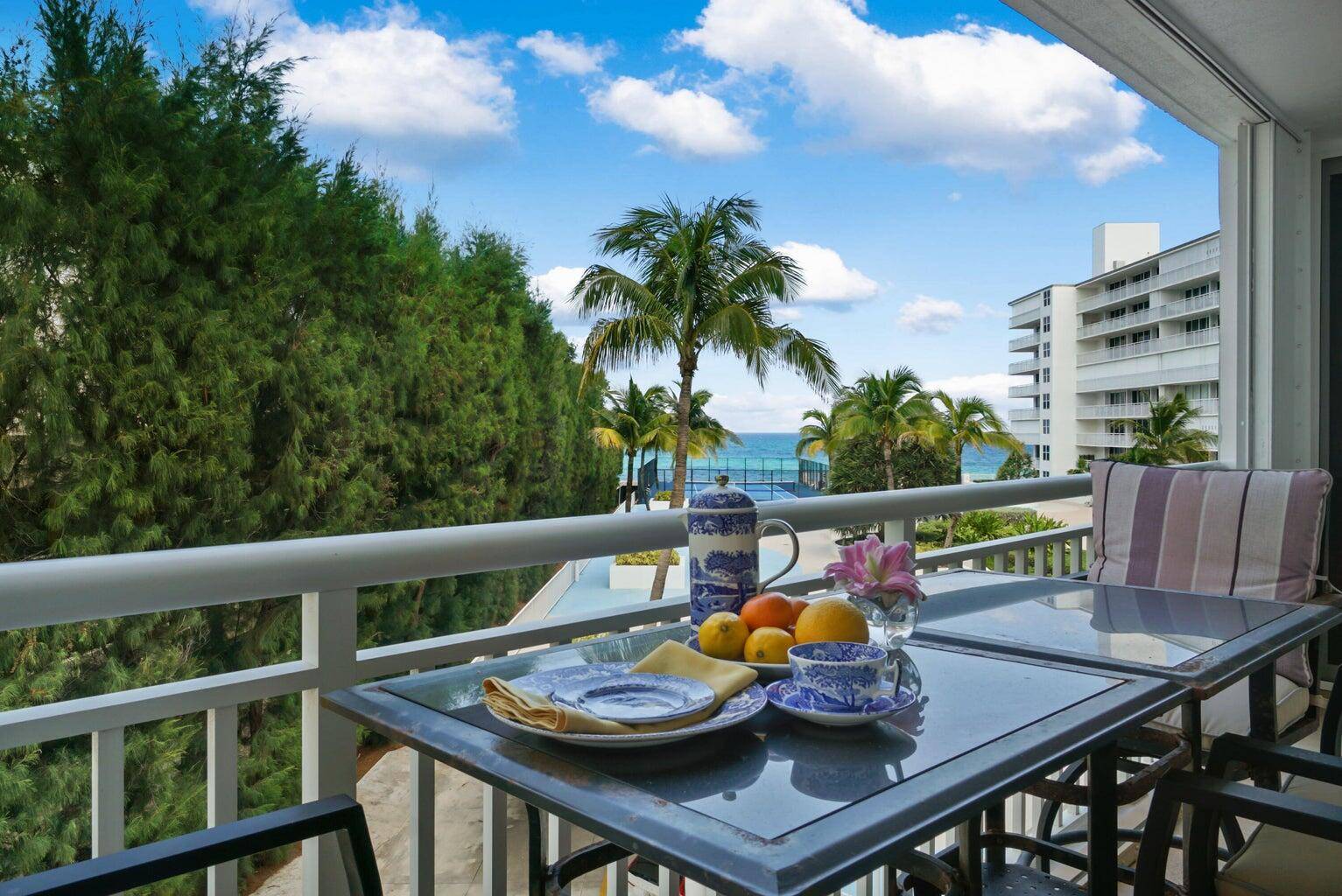 This gorgeous 2 bed 2 bath corner unit features an expansive balcony with views of the ocean and tennis court.