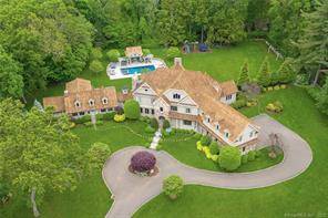 Poised on 2. 85 private acres, this remarkable home blends the best of yesterday and today.