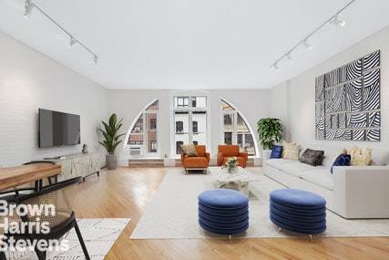Wonderful live work loft in prime Tribeca, boasting 1, 318 square feet of generous interiors enriched by hardwood floors, exposed brick walls, airy approx.