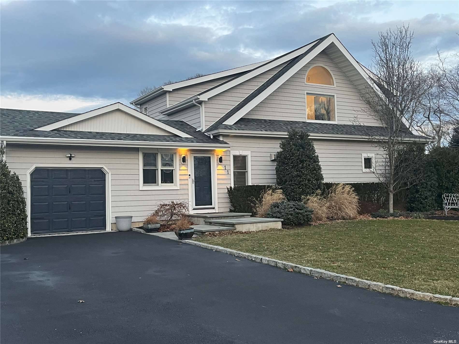 Best deal on unique home in Shinnecock Shores, a private bay community, with private fenced yard !