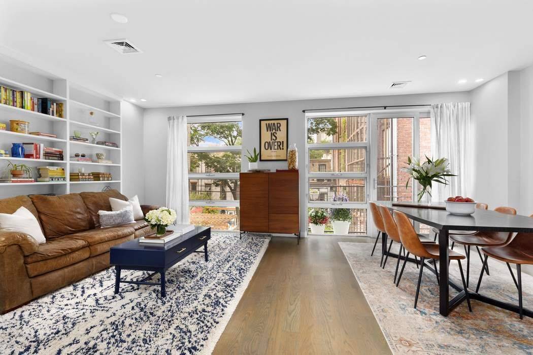 Indulge your senses in luxurious style and spaciousness in this South Slope dream triplex spanning 3 floors, with 3 private outdoor spaces, including a private rooftop terrace with expansive views ...