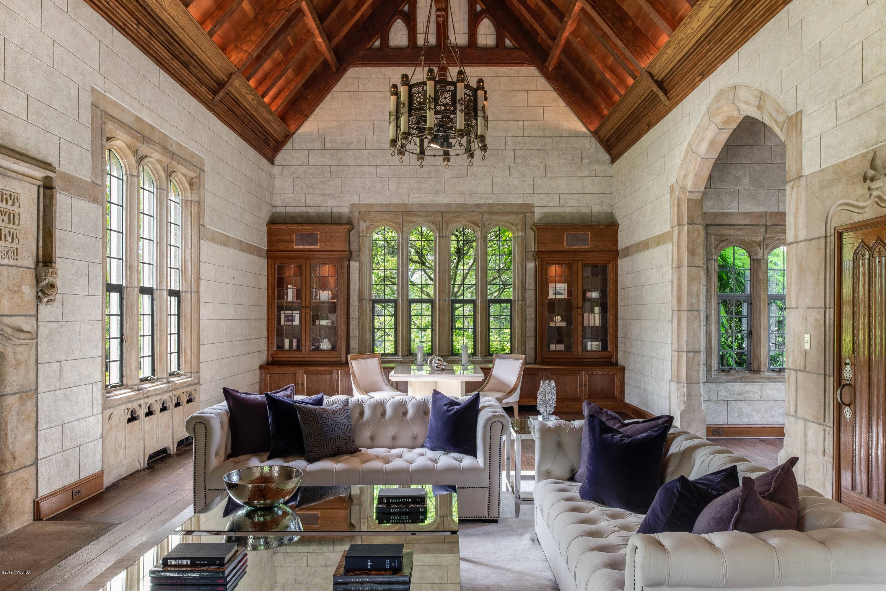 On a quiet, private lane this exquisite estate is a stunning one of a kind architectural showcase evoking european grandeur and sophistication.