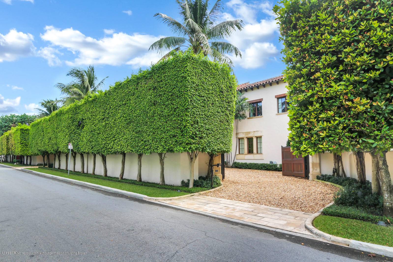 Magnificently restored important compound with gated privacy and lush tropical grounds.
