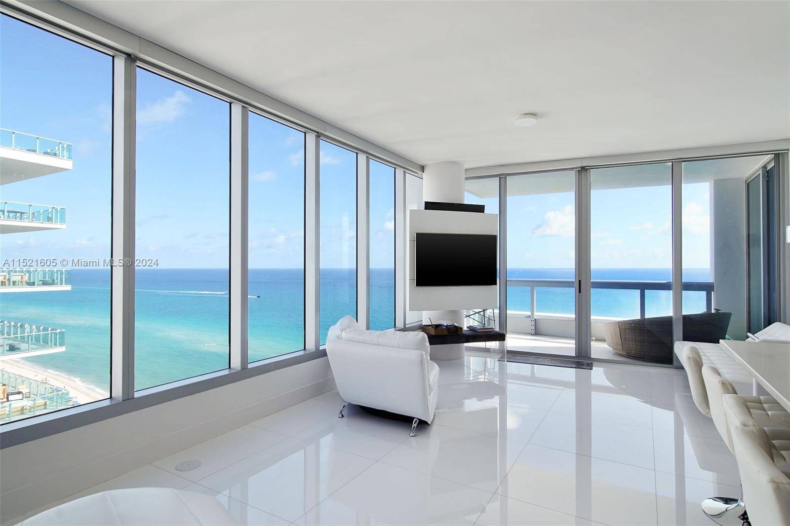 This stunning 2 bed 2 bath corner unit at the Carillon Beach Resort in Miami Beach offers breathtaking ocean views from every angle.