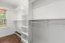 Owner's Suite walk- in closet- 1 side shown