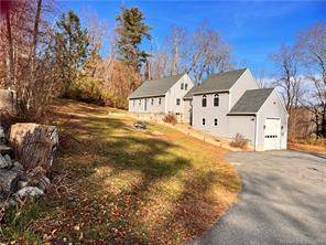 This oversized cape on tranquil Diamond Ledge Road in Stafford is move in ready.