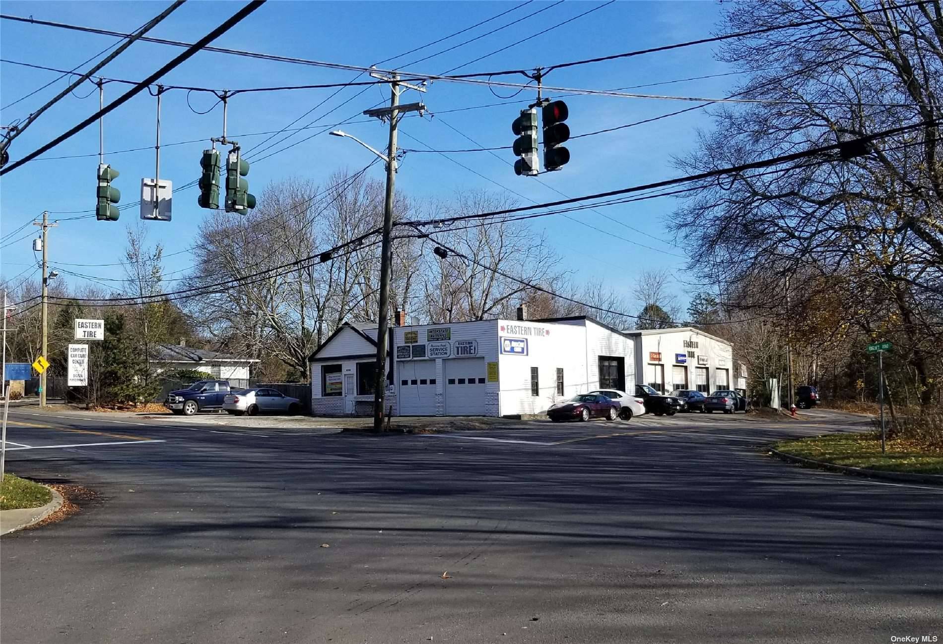 North Fork's premier candidate for redevelopment, featuring prominent visibility at major Main Road intersection regulated by traffic signal.