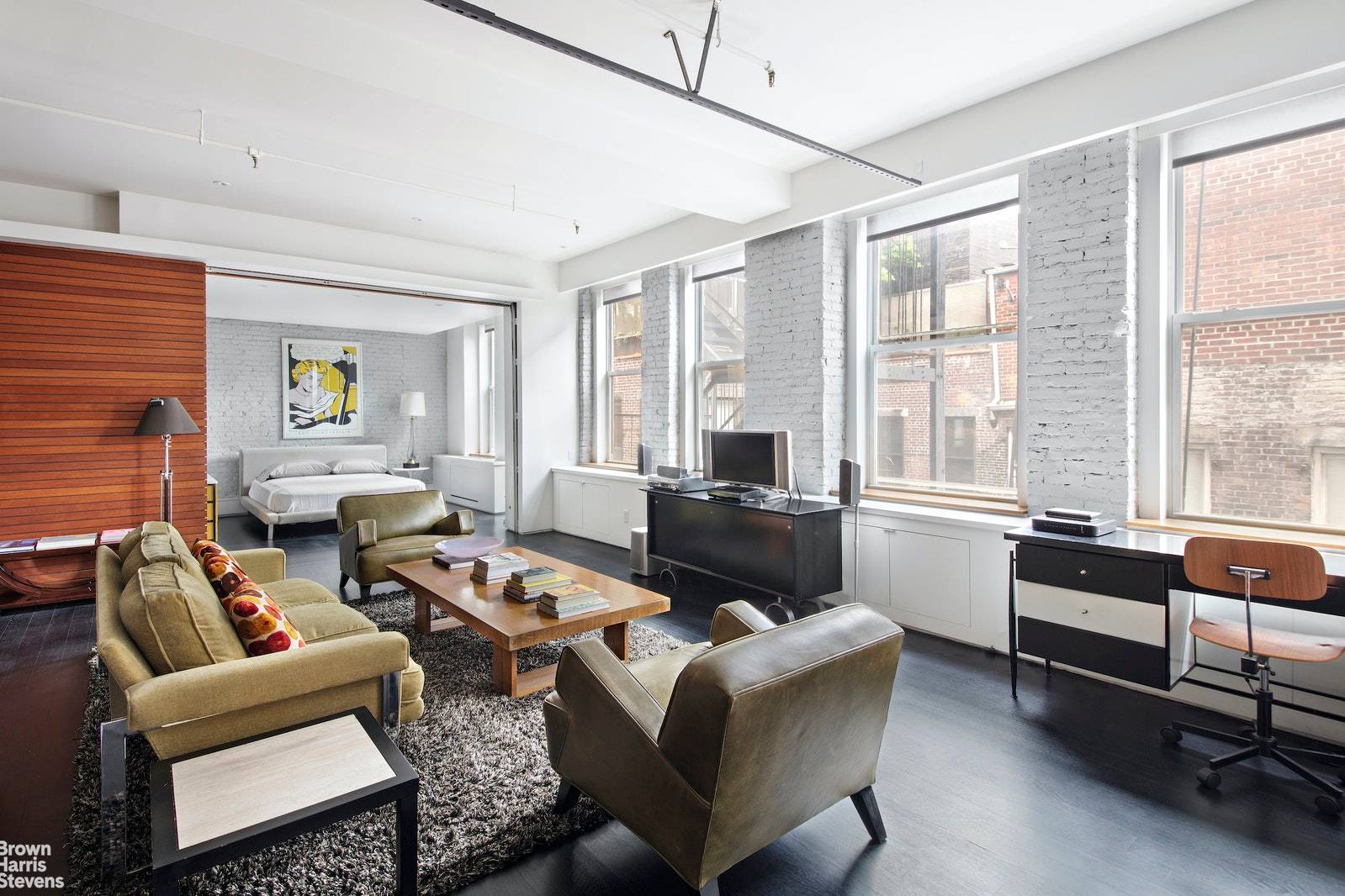 This mint and meticulously renovated Soho loft is located on a prime cobblestone block and features an extra wide layout with superb finishes throughout.