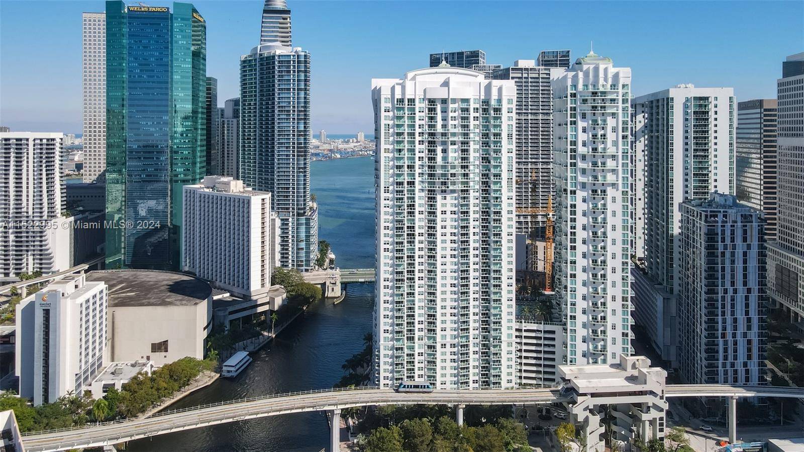 Spacious 2 2 Brickell corner unit with TWO STORAGE SPACES, PARKING ON THE SAME FLOOR, 3 large balconies overlooking the Miami River !