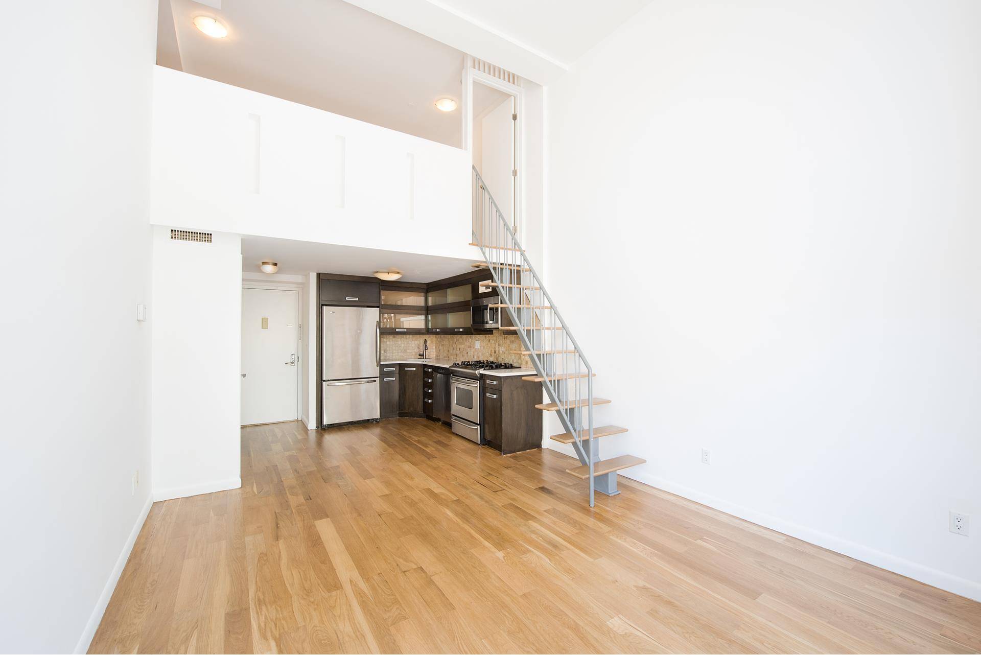 Massive convertible three bedroom, one and a half bath Condo residence close to the Montrose L train and less than 15 minutes away from Union Square.