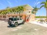 This condo unit is an end unit so you won't have another unit on one side of your unit. Notice one of Barefoot Beach Resort's picnic area that is loc