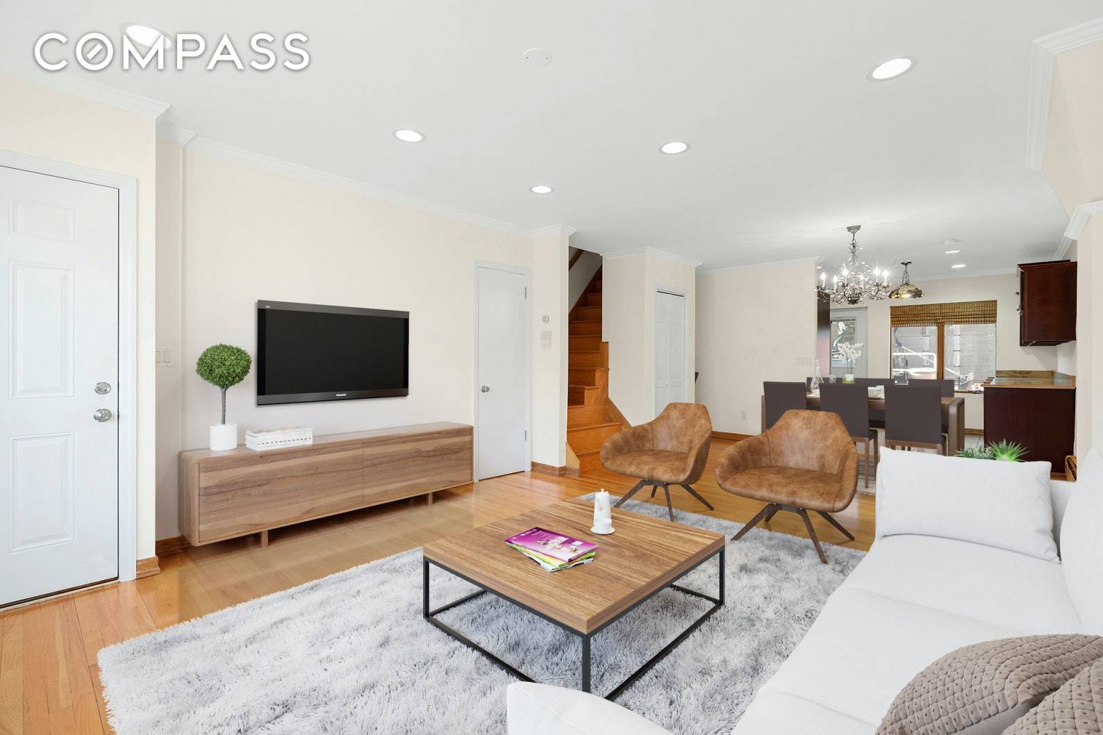 A beautiful triplex complete with a patio and TWO covered parking spots in thriving Astoria.