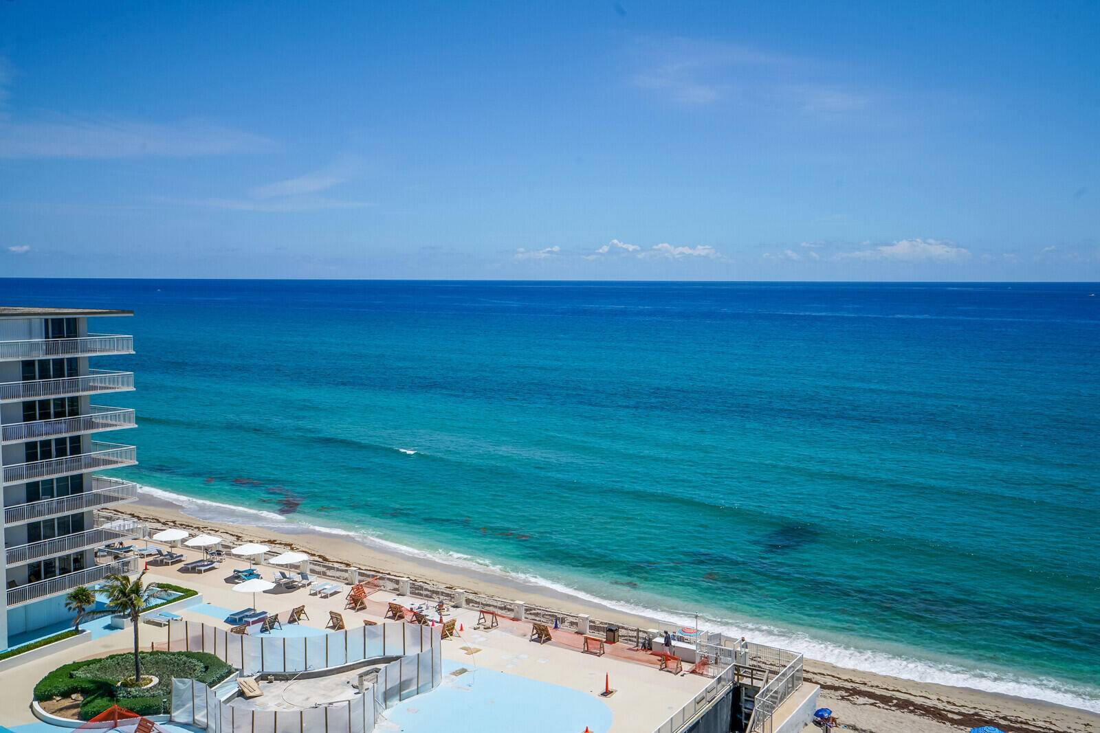 OCEAN VIEWS from every window, this vacation PENTHOUSE rental located on the sand offers idyllic, breathtaking ocean views, coastal contemporary finishes, covered parking, with amenities such as a gym, pool ...