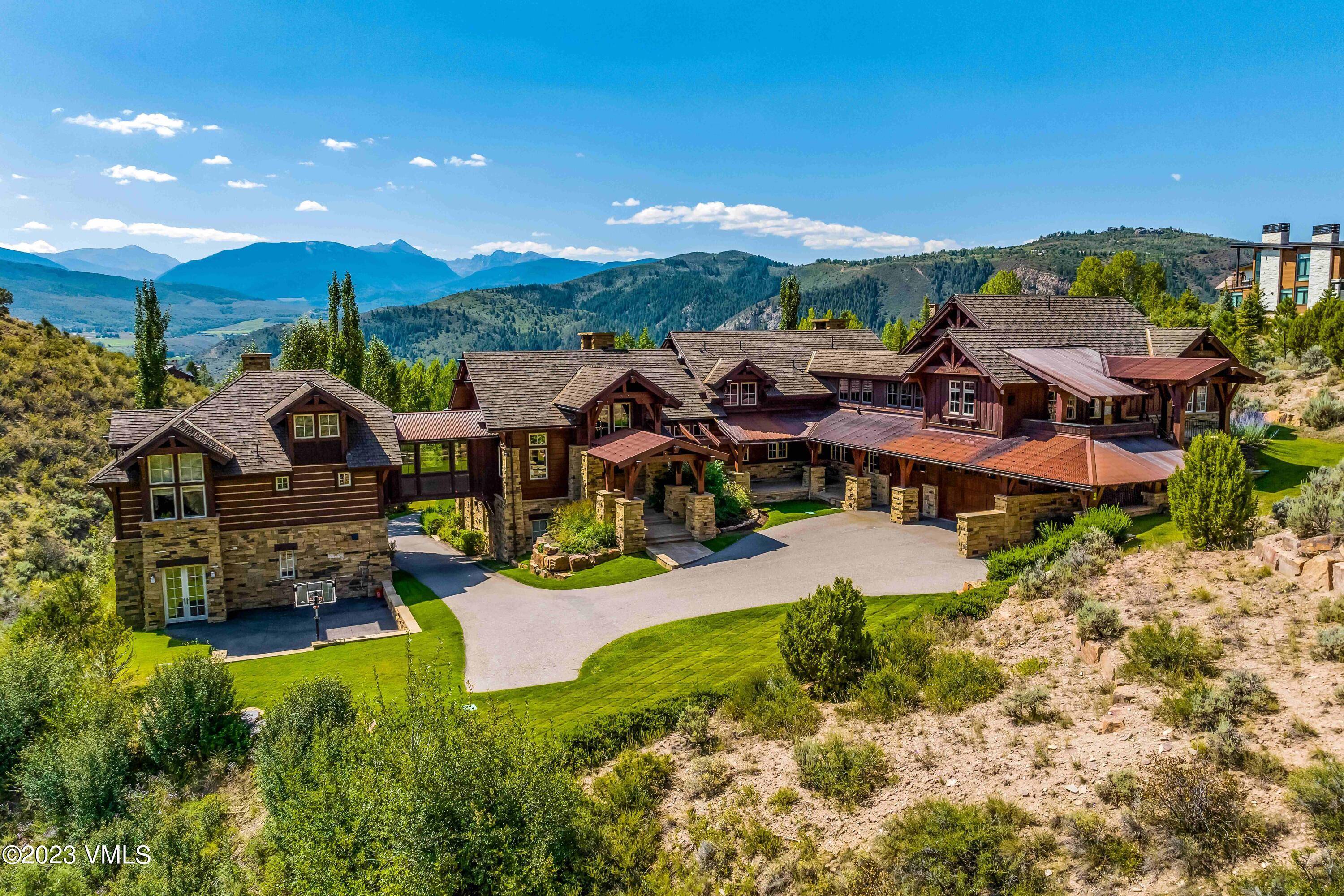 Nestled within the Cordillera Valley Club's gates, this remarkable estate occupies 1.