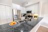 Bright, functional kitchen with open flow for entertaining.
