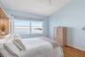 Primary Bedroom with spectacular views of the Peace River. Ensuite bath and walk-in closet.