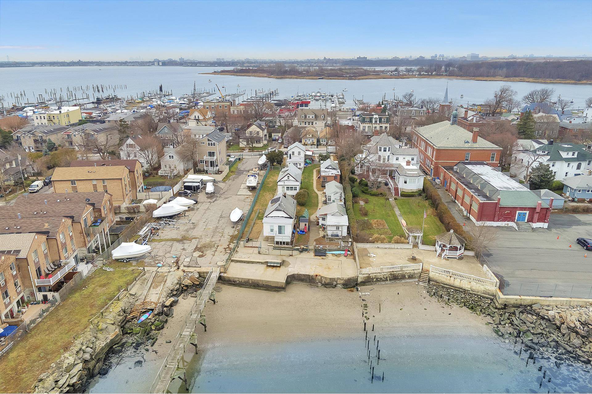Water Front Lot with 3 Detached Cottages located on the Long Island Sound.