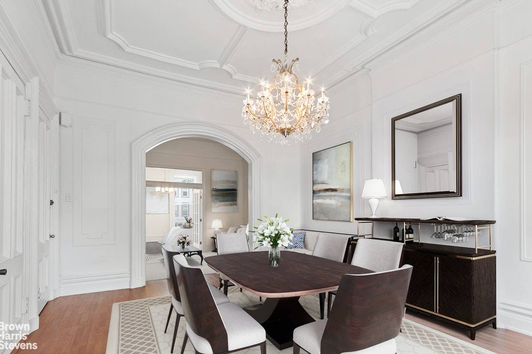 Elegant details abound in this classically ornate, 25 foot wide, Carroll Gardens three family mansion.