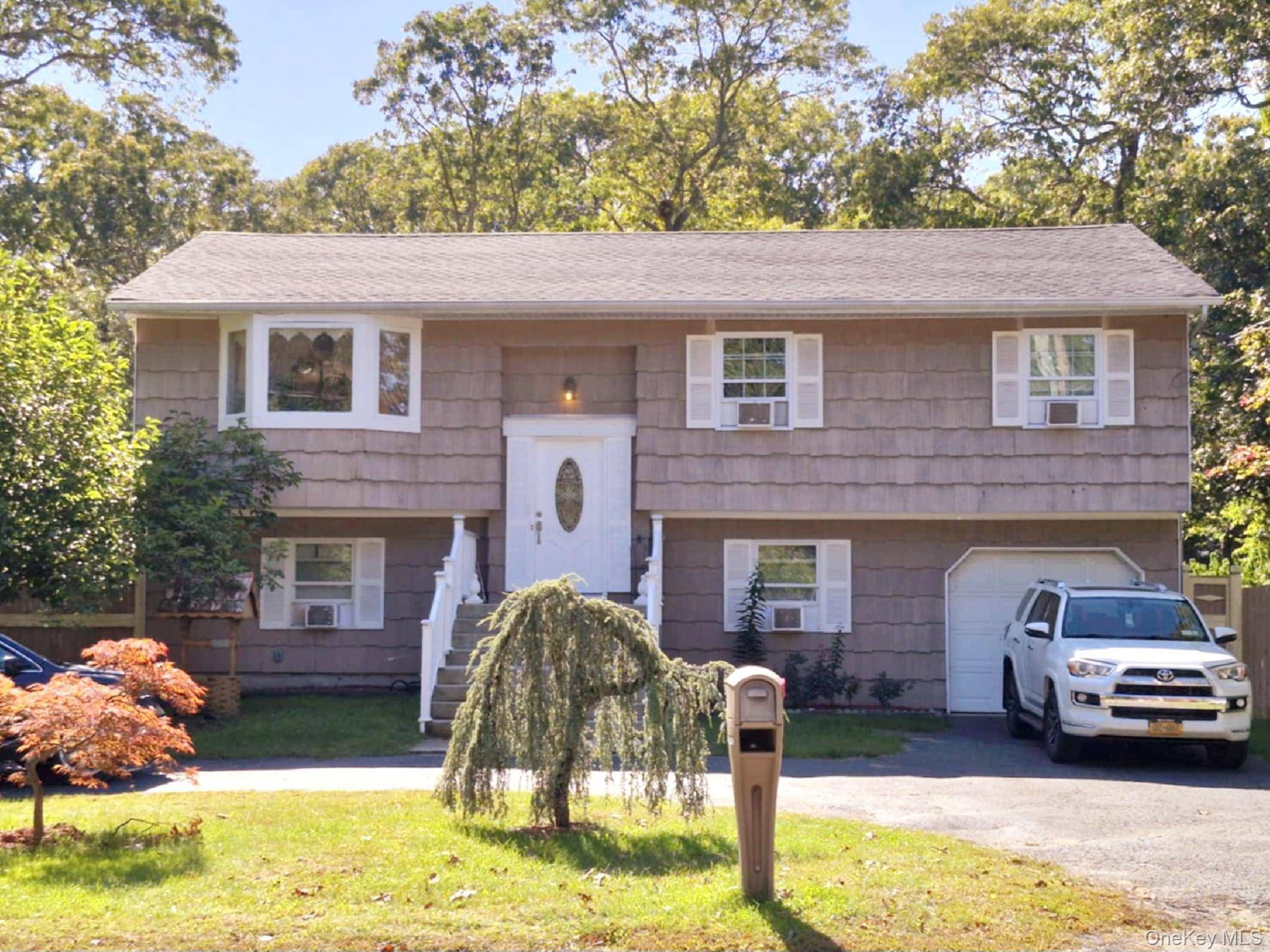 Beautifully Maintained High Ranch Style Home with Endless Possibilities !